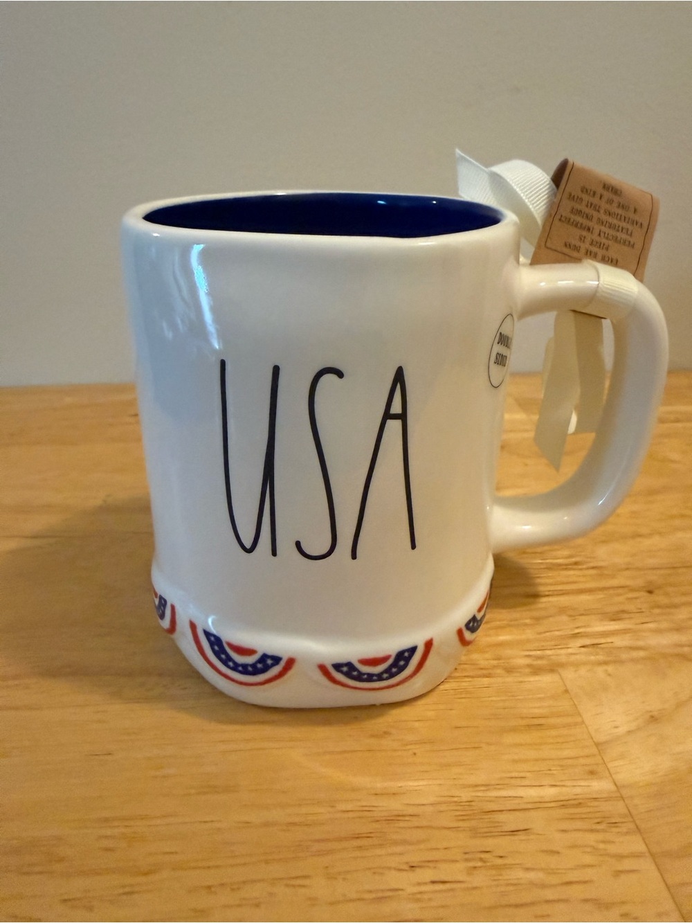 Rae Dunn White Mug with Blue Interior and Red & Blue Banner Accents